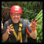 Dario about to fly over a waterfall on the zipline in Hawaii!